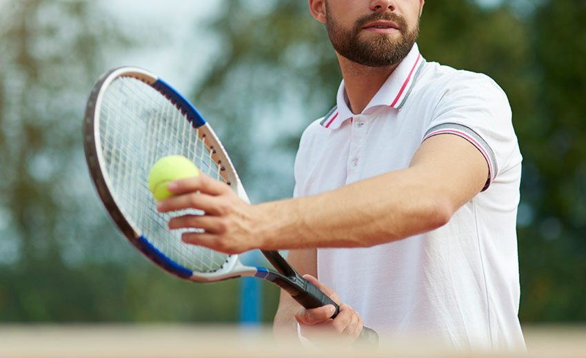 Man playing tennis at Wimbledon | Stroke Recovery Foundation